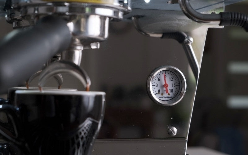 Espresso machine brewing a coffee. Coffee pouring into two shot