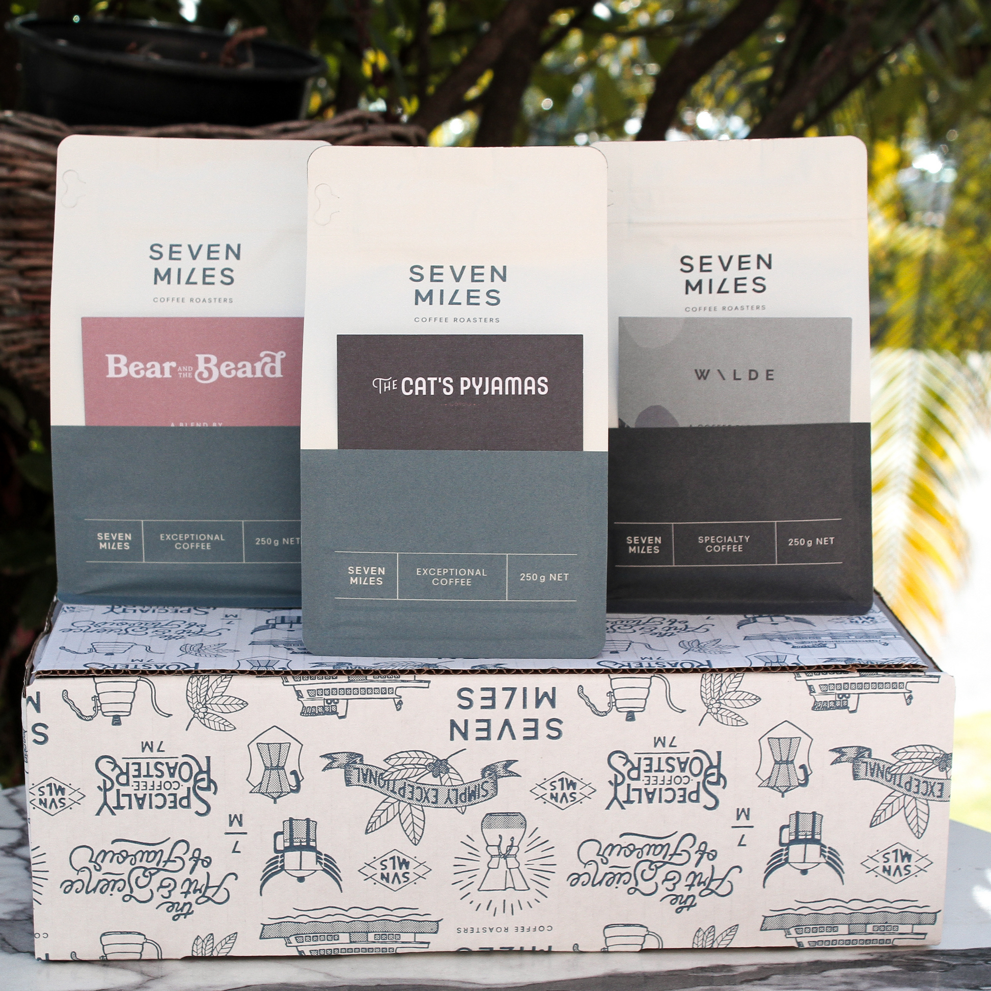 Three of Seven Miles' bestselling coffee blends in our new coffee blend sampler pack including Cat's Pyjamas, Bear and the Beard and Wilde 250g Coffee bags shipped on a beautiful box.