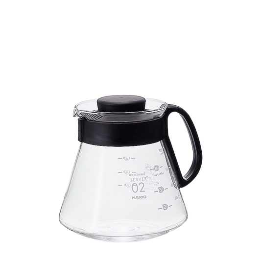 Image of Hario V60 Pour Over 02 server, a heat-resistant glass carafe with a plastic handle and lid, designed for use with Hario V60 dripper and paper filters, suitable for brewing and serving pour-over coffee, with a capacity of 700ml, and marked measurements on the side for precision brewing and pouring.
