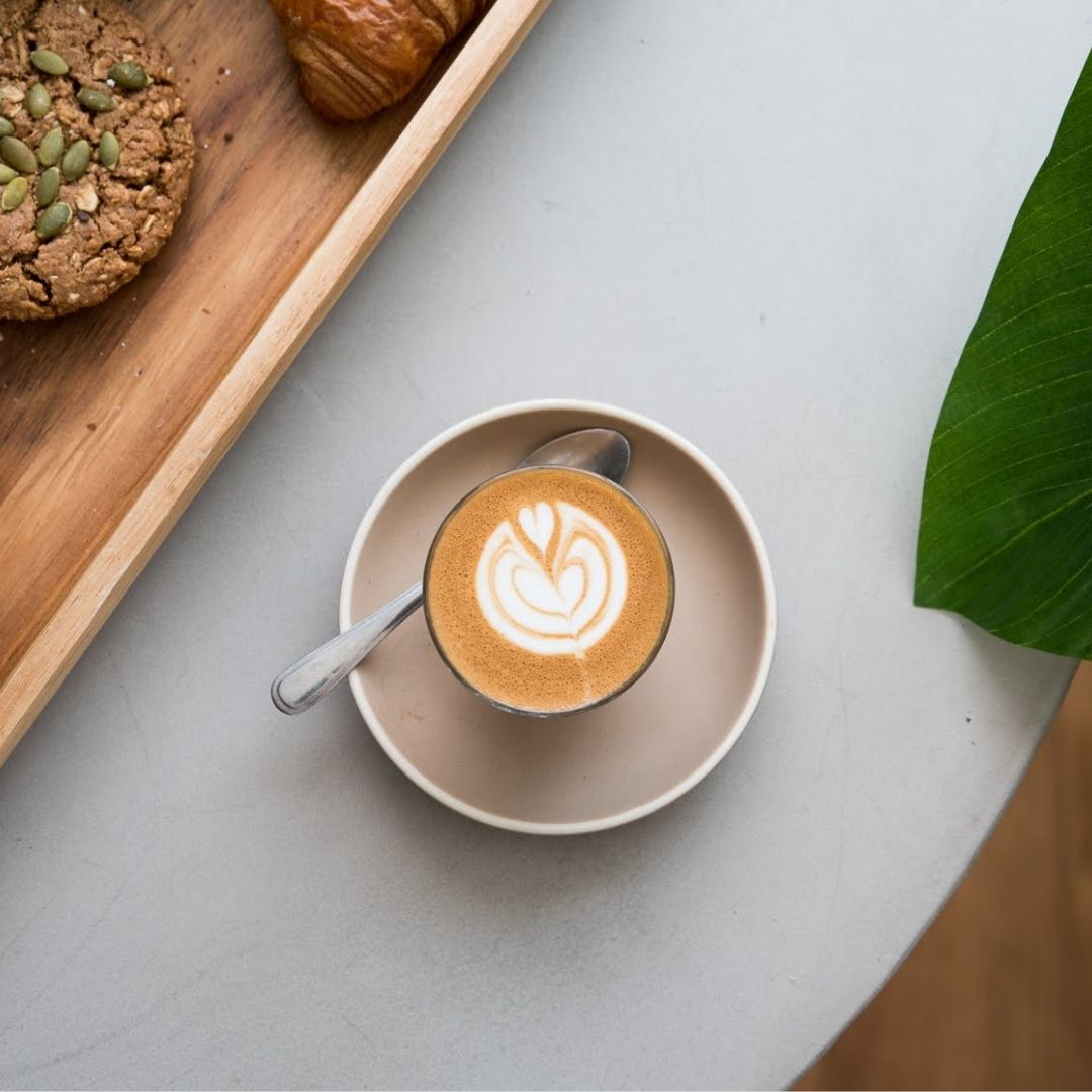 Decaf latte on bench