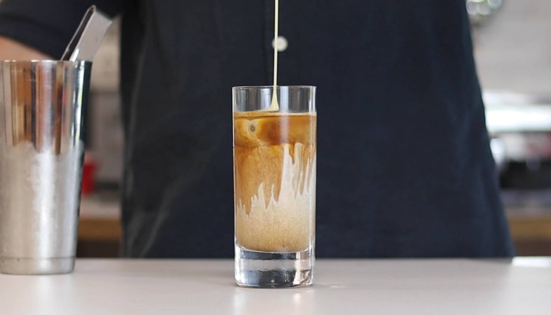 Iced Coffee on bench||cold brew coffee pouring over ice|iced filter coffee pouring into glass|iced filter coffee recipe|coffee varieties best suited for iced coffee|cold brew float (spider) recipe
