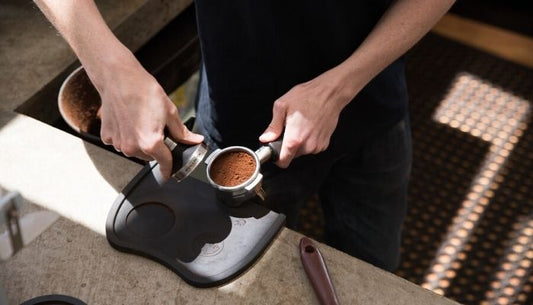 tamping coffee|||angled tamp side by side|correct tamp grip|tamp coffee on the edge of bench|tamping body posture|puqpress automatic tamping machine|used coffee puck channel|angled coffee tamp|tamp pressure kiwifruit
