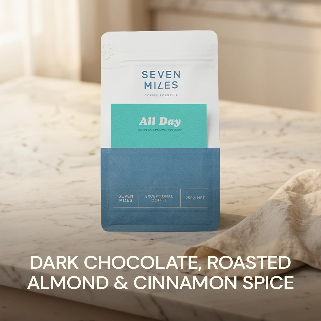 Seven Miles All Day 250 whole bean coffee –  dark chocolate, roasted almond and cinnamon spice half caf blend.