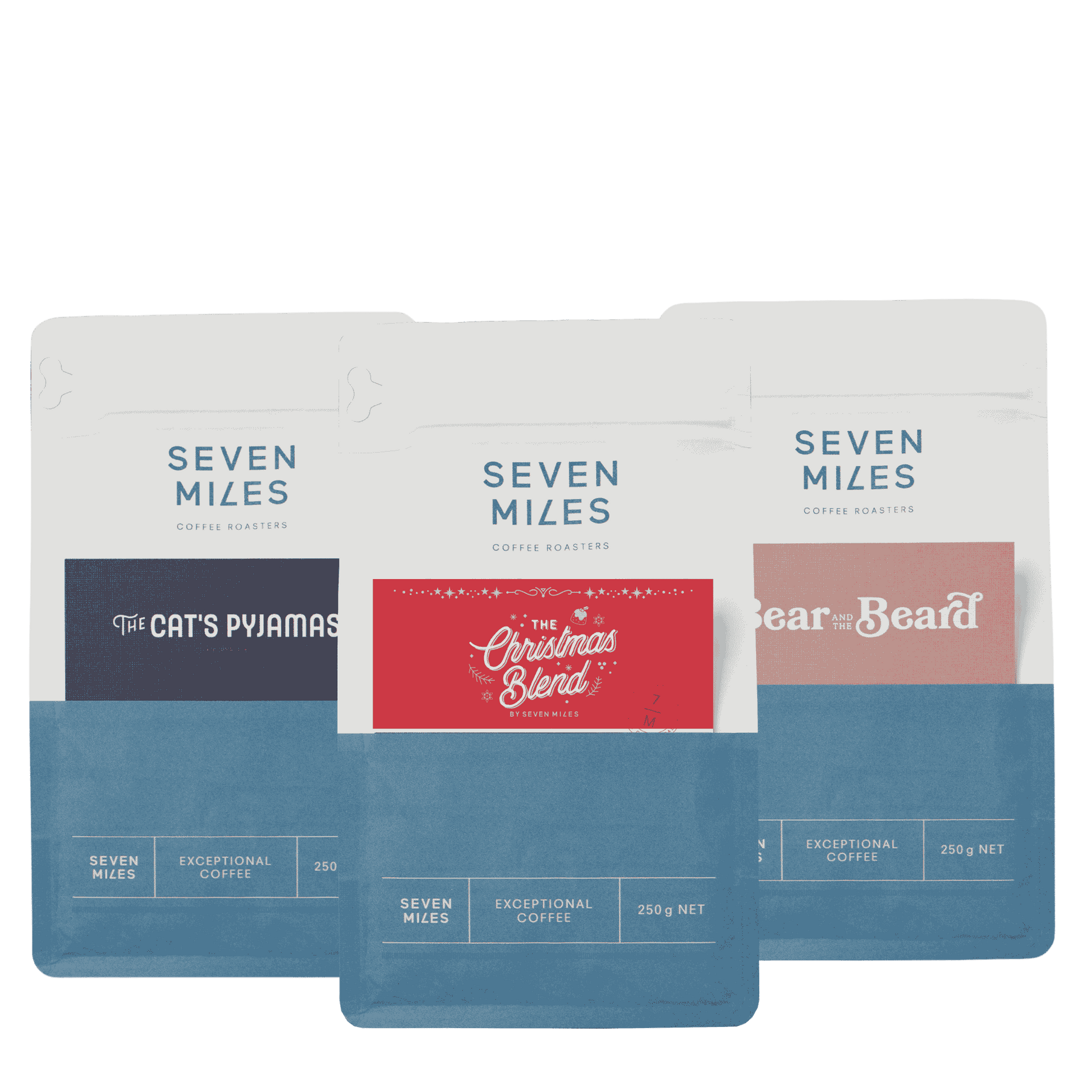 A Christmas sampler pack from Seven Miles Coffee Roasters, the perfect gift for coffee lovers, containing 3 x 250 GR bags; The Catt's Pyjamas, Bear and The beard and the limited edition The Christmas Blend