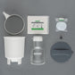 Collection of Toddy coffee brewing equipment on a gray background