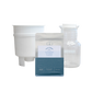 A product bundle featuring a white plastic funnel, a clear glass decanter with 'TODDY' printed on it, and a silver and teal pouch of 'Gold Reef' Coffee Roaster Blend.